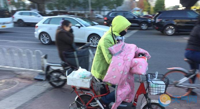 北京大风蓝色预警驱走雾霾 今最高14℃是下半年最低温