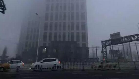 哈尔滨局地气温跌至20℃ 局部地区有不足500米的雾