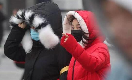 新冷空气造访北京驱霾 夜间气温-4℃需多添衣物