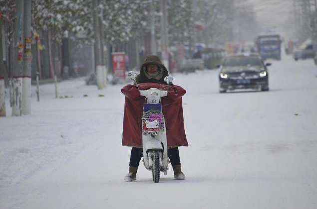 大范围雨雪今夜结束 江南温暖遭冷空气搅局降气温