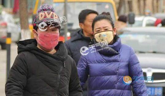 北京城寒风凛冽气温仅有20 目前大风黄色预警生效中