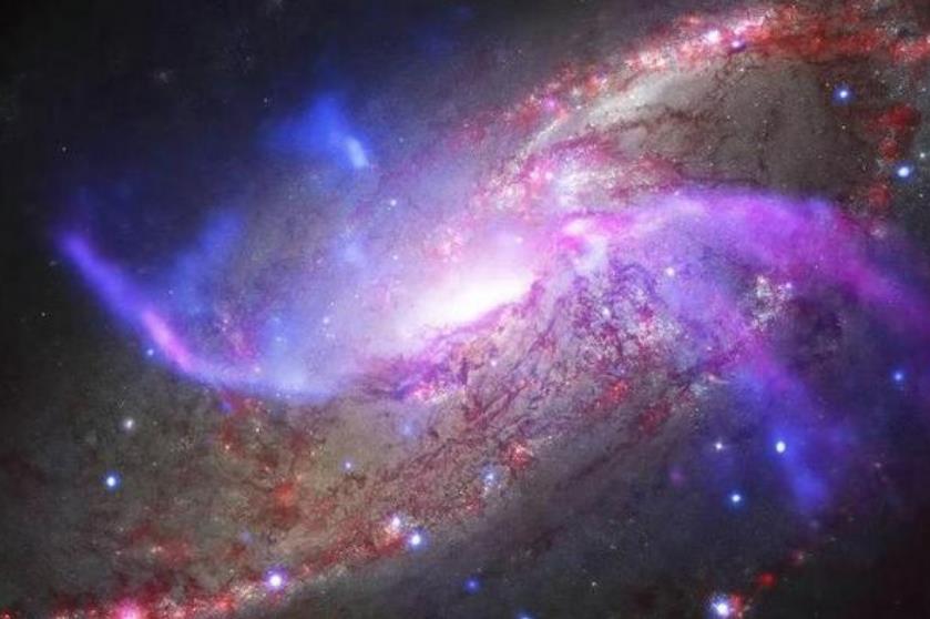 NASA公布星系碰撞照片 位于2300万光年以外