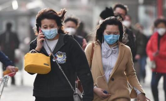 北京气温持续低迷仅有14℃ 市民出行注意添衣保暖